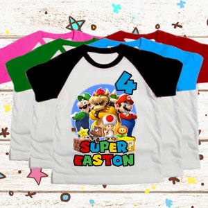 パーソナライズされたスーパーマリオバースデーシャツ、スーパーマリオファミリーシャツ、バースデーパーティーシャツ、カスタムスーパーマリオバースデー幼児用Tシャツラグラン