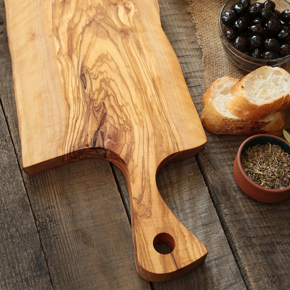 Live edge olive wood rustic cutting board with handle Etsy