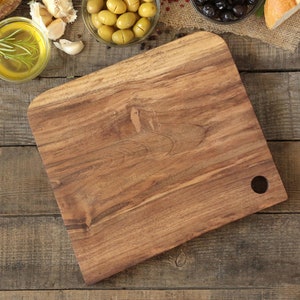 Walnut wood rustic cutting board
