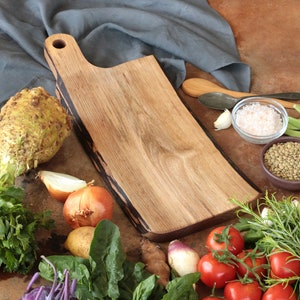 Chopping board made of walnut wood with hole handle image 1