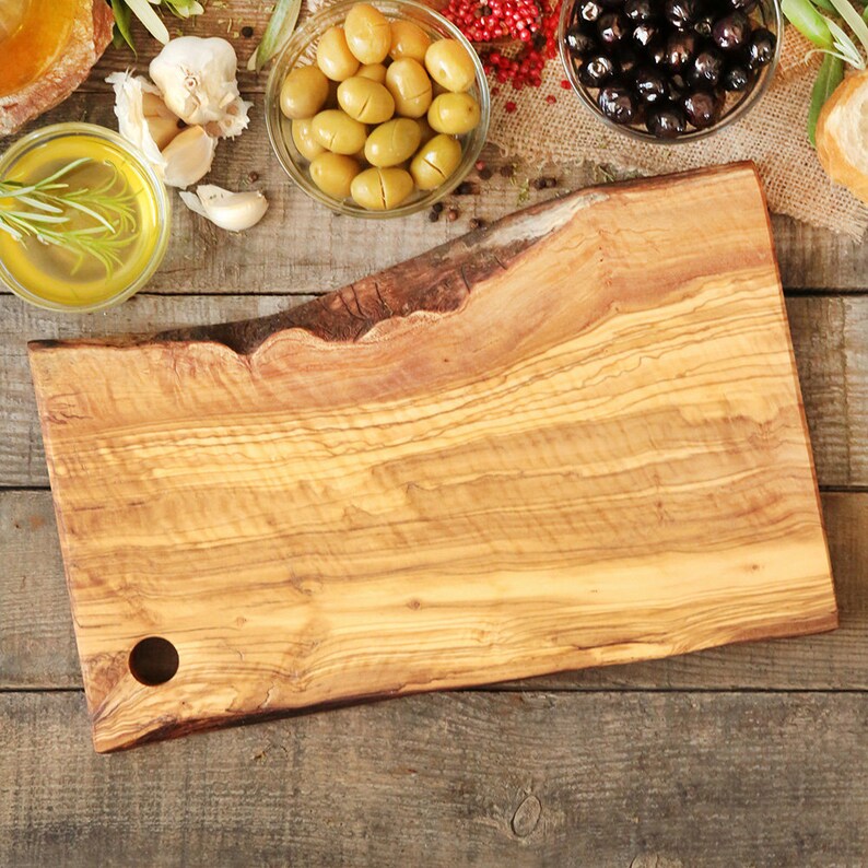 Olive wood cutting board with hole and handle image 3