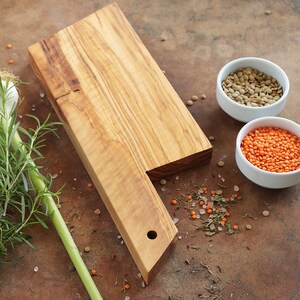 Olive wood cutting serving board