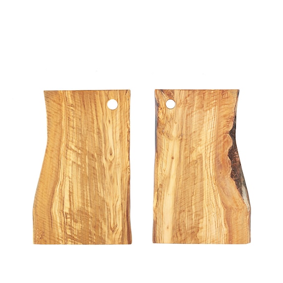 Natural shaped cutting board with handle and a hole for hanging