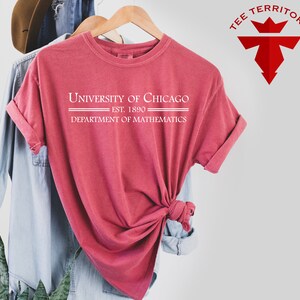 May include: A red t-shirt with the text "University of Chicago - Est. 1890 - Department of Mathematics" printed in white.