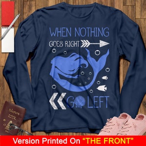 May include: Navy blue long-sleeve shirt with a mermaid graphic and the text "When nothing goes right, go left".