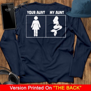 Puede incluir: Camiseta de manga larga azul marino con texto blanco que dice "Your Aunt My Aunt" y una silueta de una mujer a la izquierda y una sirena a la derecha.