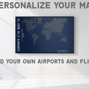 May include: A framed world map with a dark blue background, displaying flight paths and marked locations. The text "AIRPORTS I'VE BEEN TO" is on the left side. The text "PERSONALIZE YOUR MAP" and "ADD YOUR OWN AIRPORTS AND FLIGHTS" are also visible.