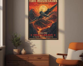 Op de afbeelding: Een vintage luchtvaartposter met de tekst "FLY BEYOND THE FIRE MOUNTAINS" en "ONLY THE BRAVE TAKE THIS ROUTE". De poster toont een vliegtuig dat over bergen vliegt met een zonsondergang op de achtergrond. De woorden "DIGITAL DOWNLOAD" staan bovenaan.
