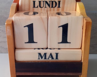 perpetual calendar in varnished wood