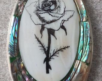 mother-of-pearl pocket mirror