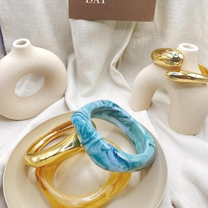Bold and Playful Resin Bangles for Effortless Style