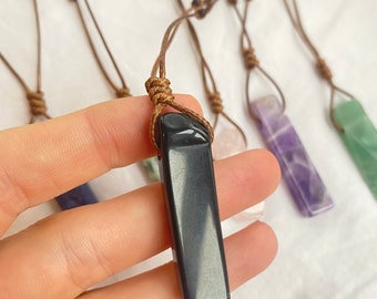 Raw natural Obsidian crystal shard necklace. High grade crystal pendant with adjustable brown drawstring cord.