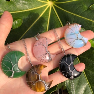 7 stones! Hand wire-wrapped crystal moon necklace. High grade crystal with 20 inch stainless steel chain. Rose quartz, amethyst, aventurine.