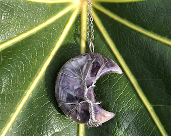 Hand wire-wrapped Amethyst crystal moon necklace. High grade crystal with 20 inch stainless steel chain.