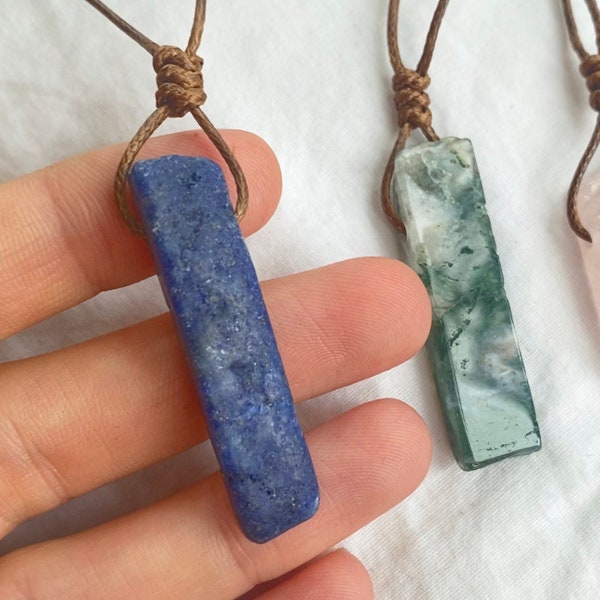 Raw natural lapis lazuli crystal shard necklace. High grade crystal pendant with adjustable brown drawstring cord.