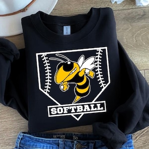 May include: Black sweatshirt with a white baseball diamond graphic featuring a cartoon bee and the text "Softball".
