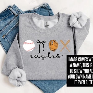 May include: Gray sweatshirt with a baseball, a glove, two crossed bats, and the text "OX eagles".
