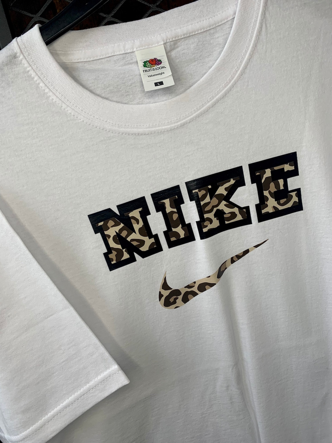 white nike leopard print