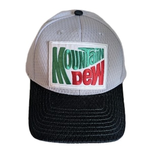 Mountain Dew-kepslogotyp. Grönsvart/silver. Vintage-känsla. Ny. Komfort och stil.