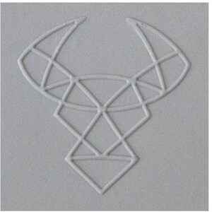 May include: A white geometric design of a bull's head with horns on a gray background.