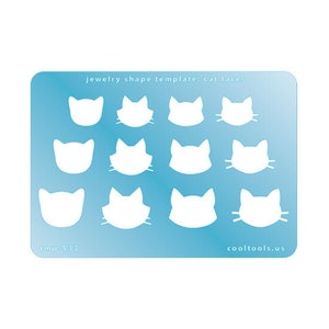 May include: A blue template sheet with 12 cat face shapes for jewelry making. The sheet has the text "jewelry shape template: cat faces" at the top and "tmp-5333" and "cooltools.us" at the bottom.