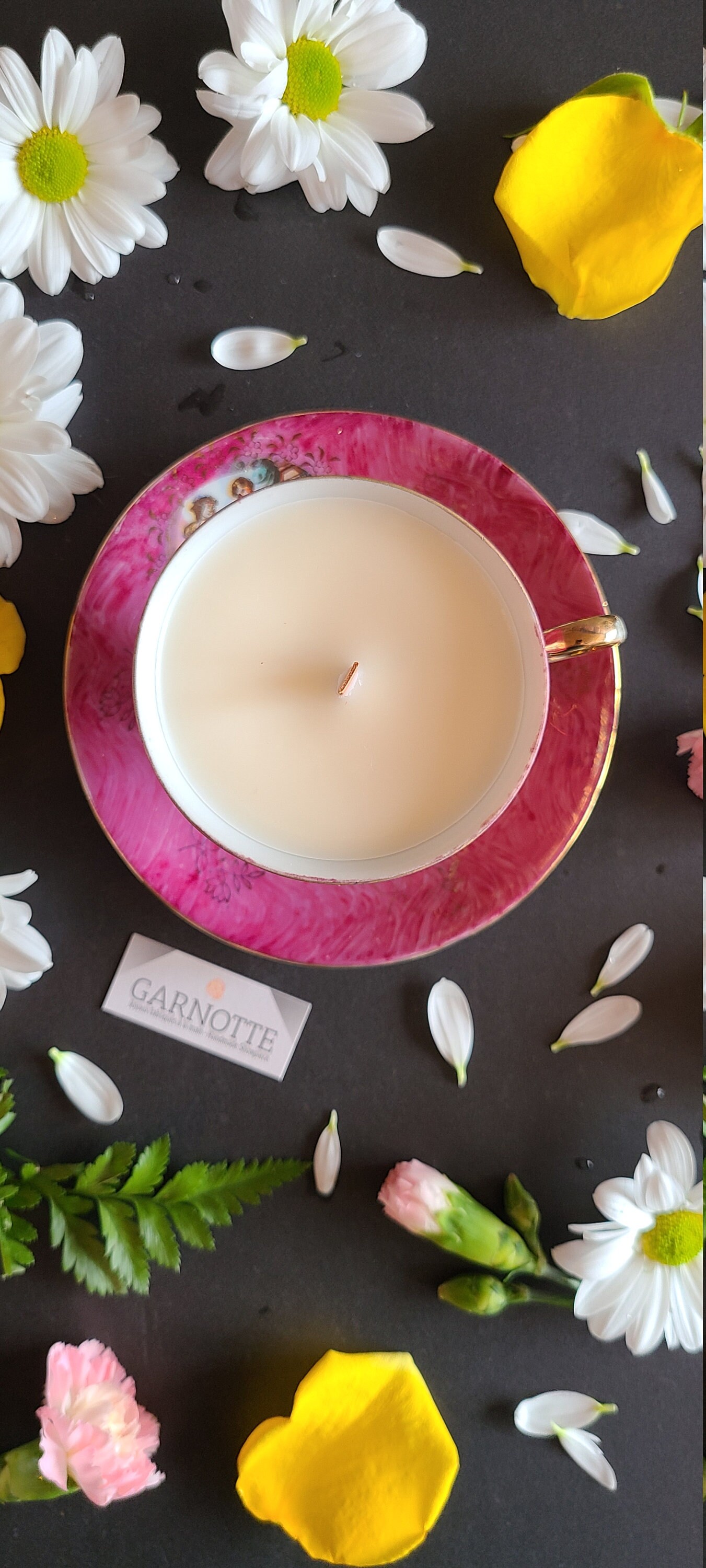 Scented candle with bridgerton style jewelry inside
