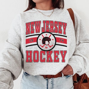 Vintage New Jersey Devils sweatshirt, NHL black graphic crewneck - AU Large