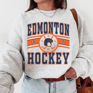 Edmonton Oilers Antigua Women's Victory Raglan Pullover Hoodie