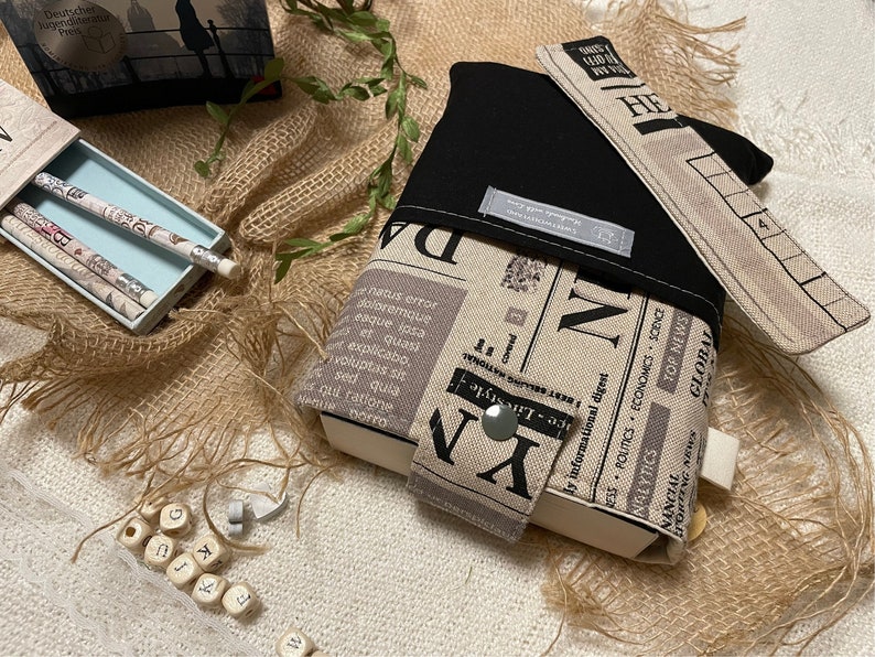 Book cover made of canvas fabric Padded book bag Newspaper look accessories Book cover including bookmark set bookmarker booksleeves image 1