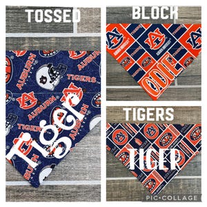 May include: Three different styles of Auburn Tigers dog bandanas. The first is a tossed style with a blue background and orange and white logos. The second is a block style with a white background and orange and blue logos. The third is a tigers style with a blue background and orange and white logos.