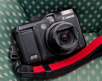 Canon Powershot G10: *Fea, con arañazos en la lente* Cámara digital retro profesional con sensor CCD de 14,7 MP y zoom óptico 4x.