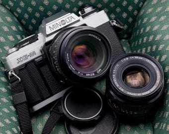 Kit de câmera Minolta XG-M de filme 35 mm: lentes 50 mm f/2 e 28 mm f/2.8, filme testado.