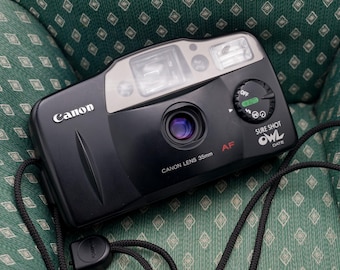 Câmera Canon SureShot Owl de filme 35 mm: Lente fixa f/4.5, estilo "apontar e disparar", testada com filme.