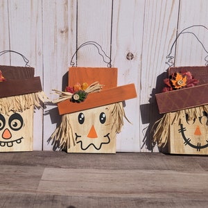 Whimsical Scarecrow Shelf Sitters - Charming hand-painted fall decor. Embrace rustic vibes with unique styles. Perfect your Autumn display!