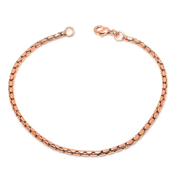 Bracciale a fascia in rame battuto e ossidato con due diverse textu... | su