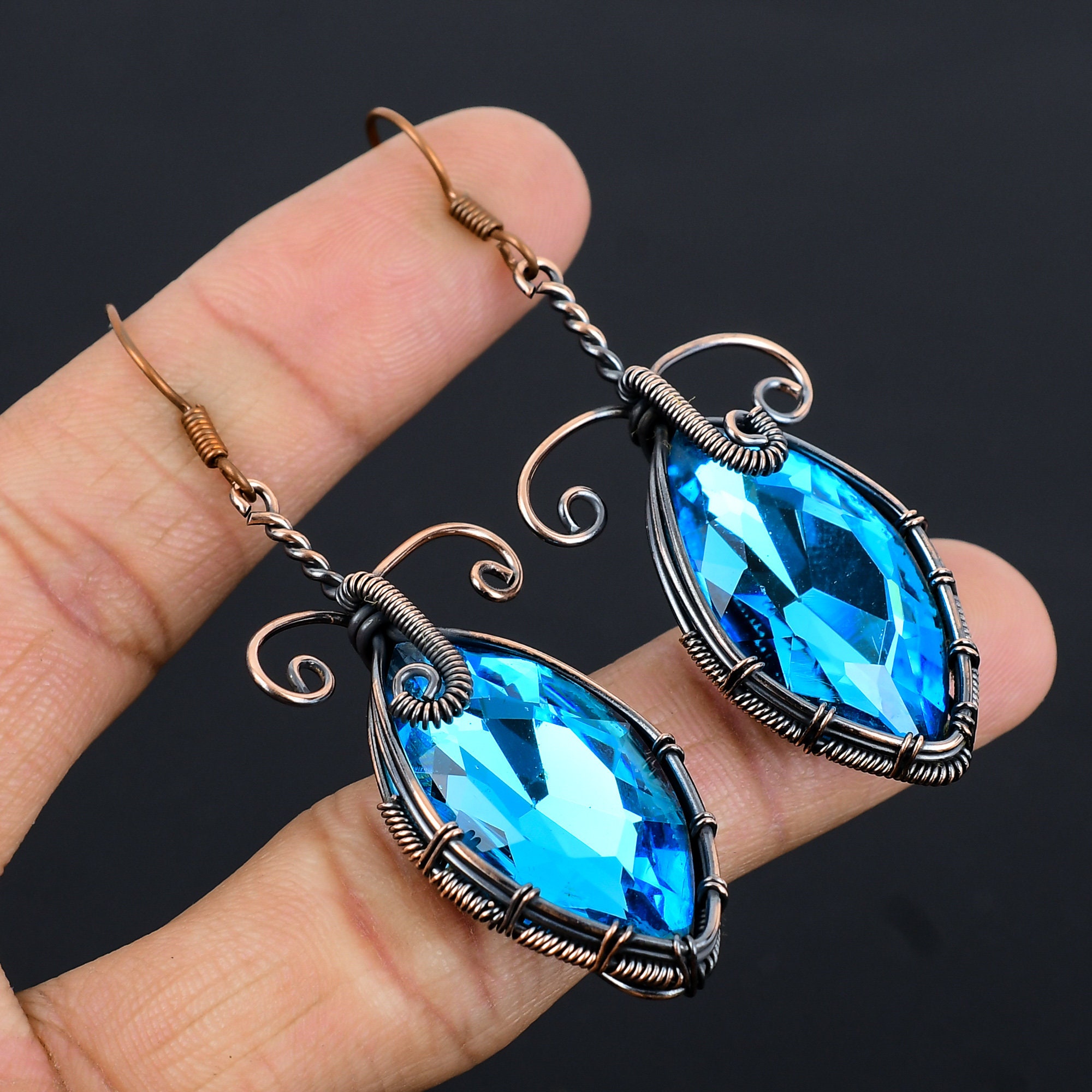 Nomadic Elegance: Blue Topaz Jewelry for Adventurous Souls