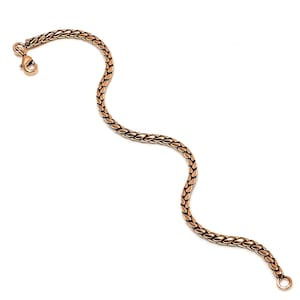 May include: A gold-toned chain bracelet with a lobster clasp.