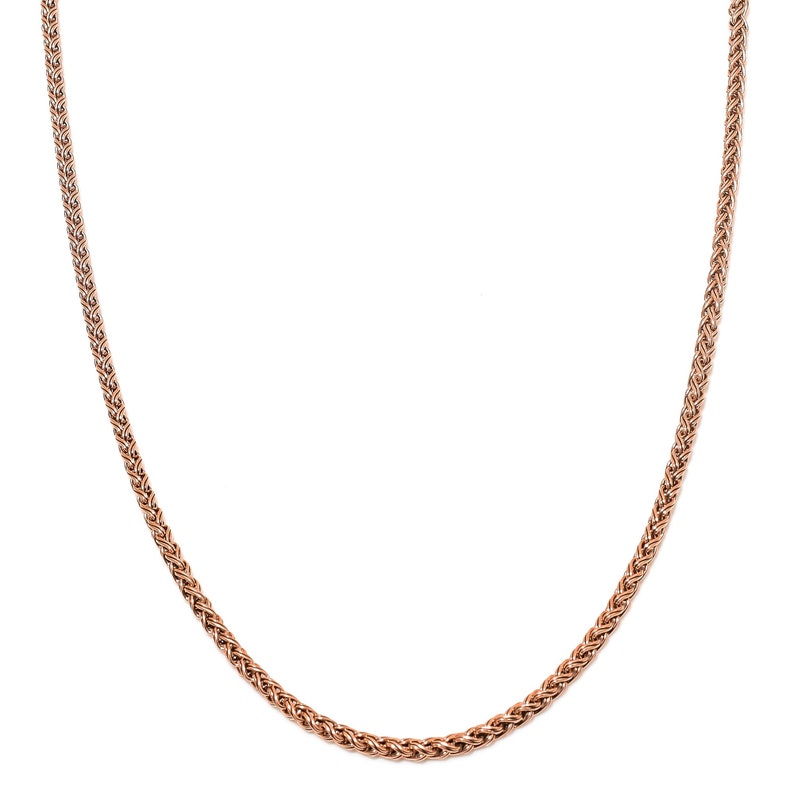 May include: A rose gold chain necklace with a braided design.