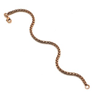May include: A gold-toned chain bracelet with a lobster clasp.