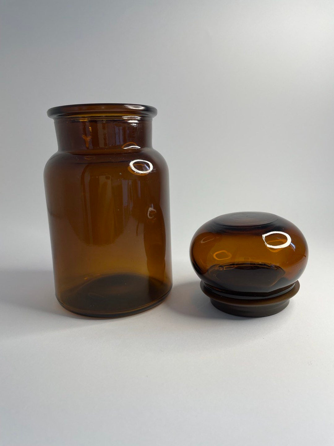 Antique DOUWE EGBERTS Jar Crafted From Smoky Glass With an Airtight Plastic Seal, Originating