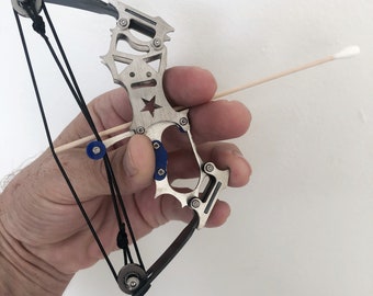 Tiny Compound Bow and Arrow Shoots Cotton Swabs