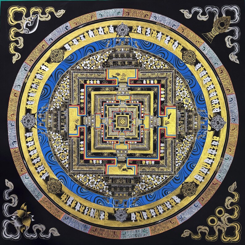 May include: A mandala with intricate details in gold and black on a black background. The mandala features a square with concentric squares inside, surrounded by a circle with a blue and white pattern. The mandala is surrounded by a border of gold and black.