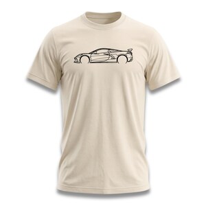 Light beige t-shirt with a black outline sketch of a sports car.