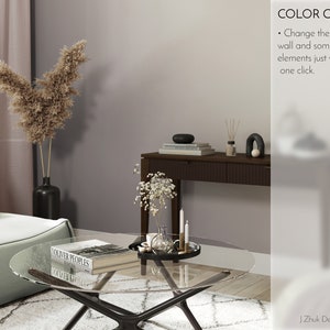 May include: A living room interior design with a light grey wall, a green sofa, a glass coffee table with a book titled "COUVER PEOPLES" on it, a vase with dried pampas grass, and a console table with a vase of white flowers, candles, and decorative objects.