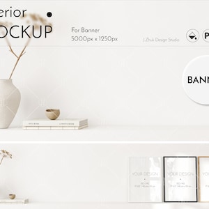 May include: A mockup of a white wall with a shelf and three framed posters. The posters are all the same size and have a white background with black text. The text on the posters reads "YOUR DESIGN" and includes the dimensions "150/A3 17.5/42.9 cm".