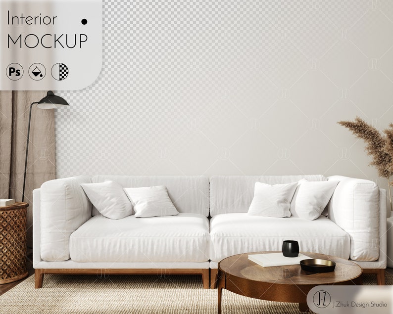 May include: A white sectional sofa with three pillows sits in front of a white wall with a checkered pattern. A small wooden table with a black cup and a gold tray sits in front of the sofa. A wooden floor with a woven rug is visible in the foreground.