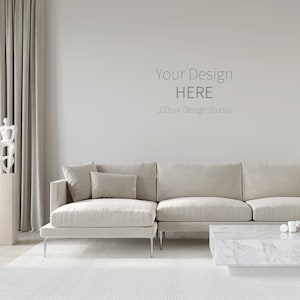 May include: A white sectional sofa with a white marble coffee table in a modern living room with a white wall and gray curtains. The text "Your Design HERE J.Zhuk Design Studio" is on the wall.