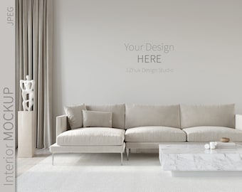 Op de afbeelding: Een witte hoekbank met een witte marmeren salontafel in een moderne woonkamer met een witte muur en grijze gordijnen. De tekst "Your Design HERE J.Zhuk Design Studio" staat op de muur.