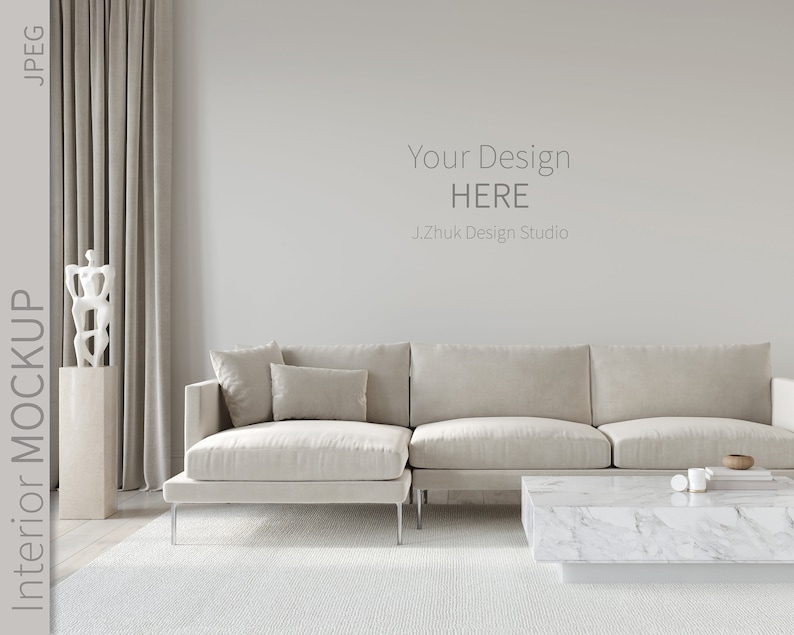 May include: A white sectional sofa with a white marble coffee table in a modern living room with a white wall and gray curtains. The text "Your Design HERE J.Zhuk Design Studio" is on the wall.