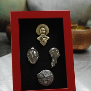 4 Classic Movie Pins Framed Nosferatu, A Trip to the Moon, Metropolis Robot, Bandit The Great Train Robbery  RED/BLACK Frame